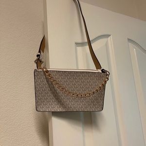 Authentic Michael Kors waist bag in white color
